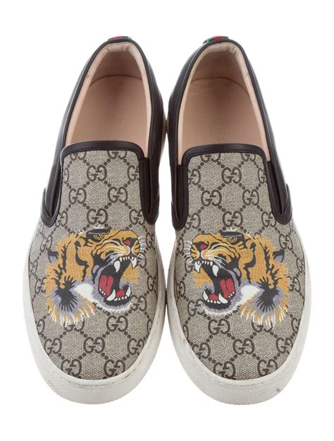 gucci tiger slip ons